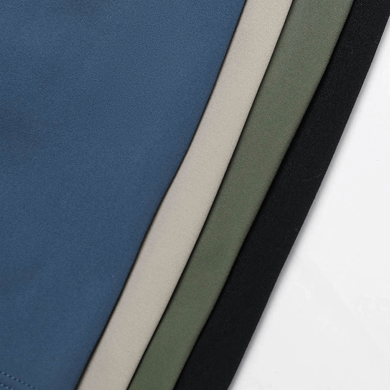 Four pairs of women's wide-leg yoga pants in blue, beige, green, and black, showcasing color options for fitness wear.